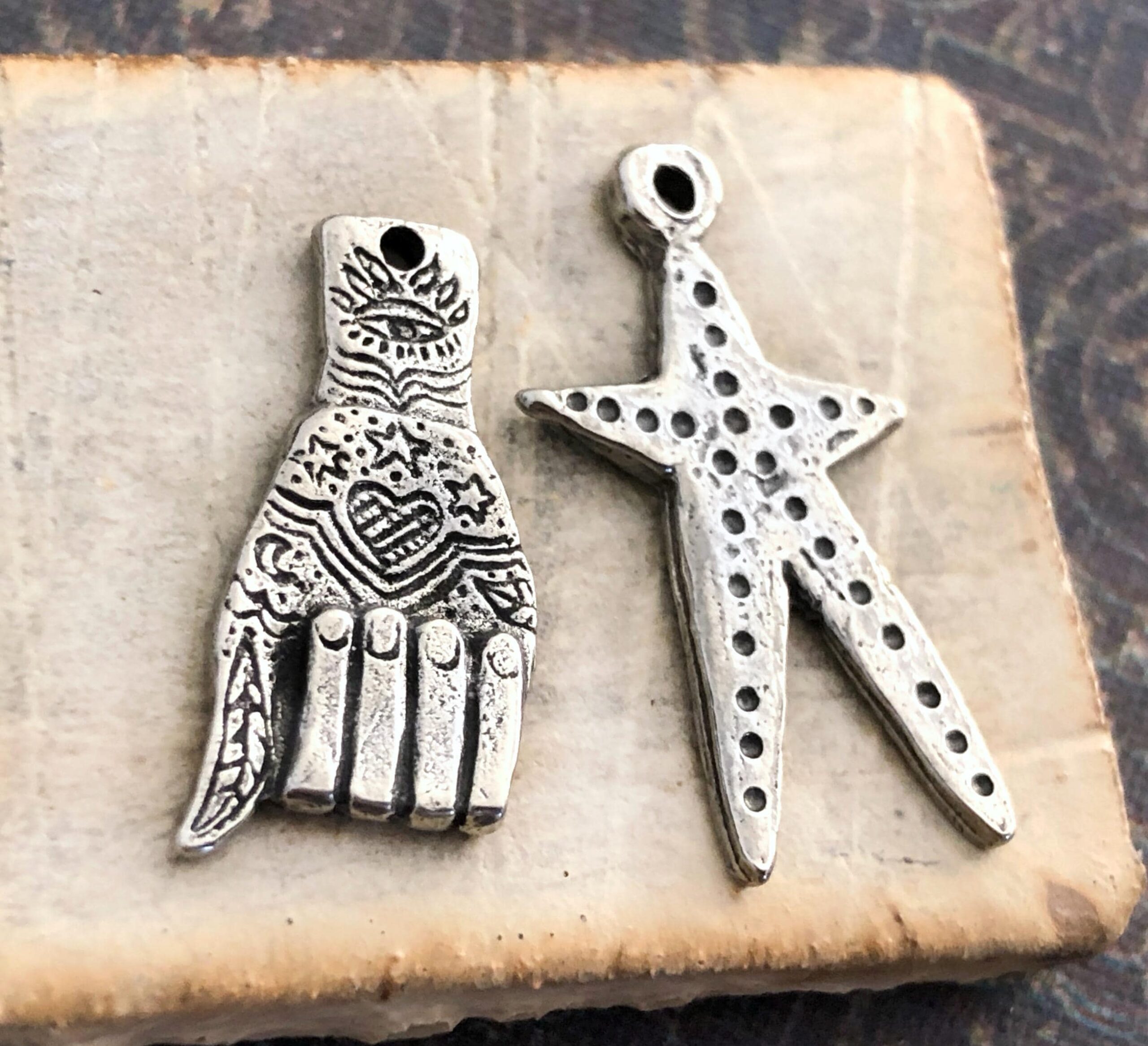 Hand & Star Charms